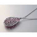 Natural Ruby 10.50 carats set in 14K & 18K White Gold Pendant with 0.50 carats  Diamonds