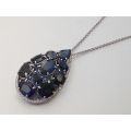 Natural Blue Sapphire 17.02 carats set in 14 & 18K White Gold Pendant with  0.50 carats Diamonds 