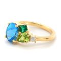 Natural Blue Topaz, Peridot, Emerald, and Diamond 2.07 carats total weight set in 14K Yellow Gold Ring