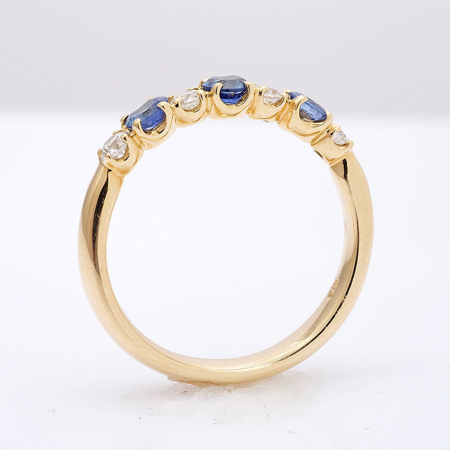 Natural Blue Sapphires 0.56 carats set in 18K Yellow Gold Ring with 0.26 carats Diamonds 