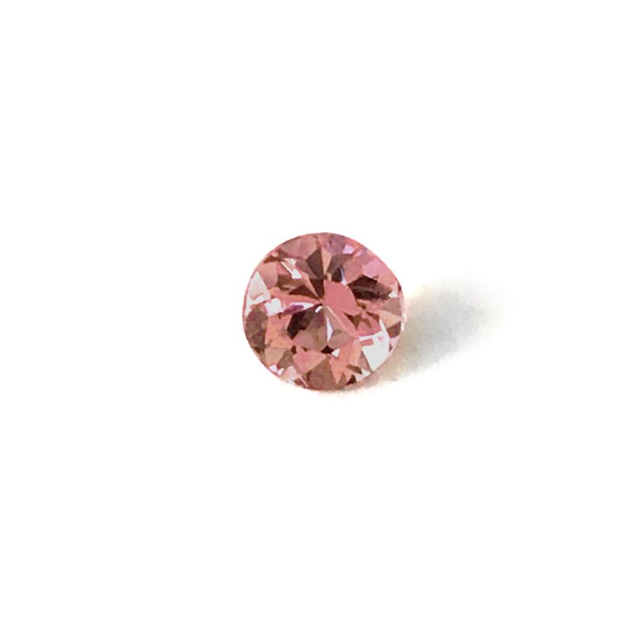 Natural Imperial Topaz pinkish-orange color round shape 0.60 carats