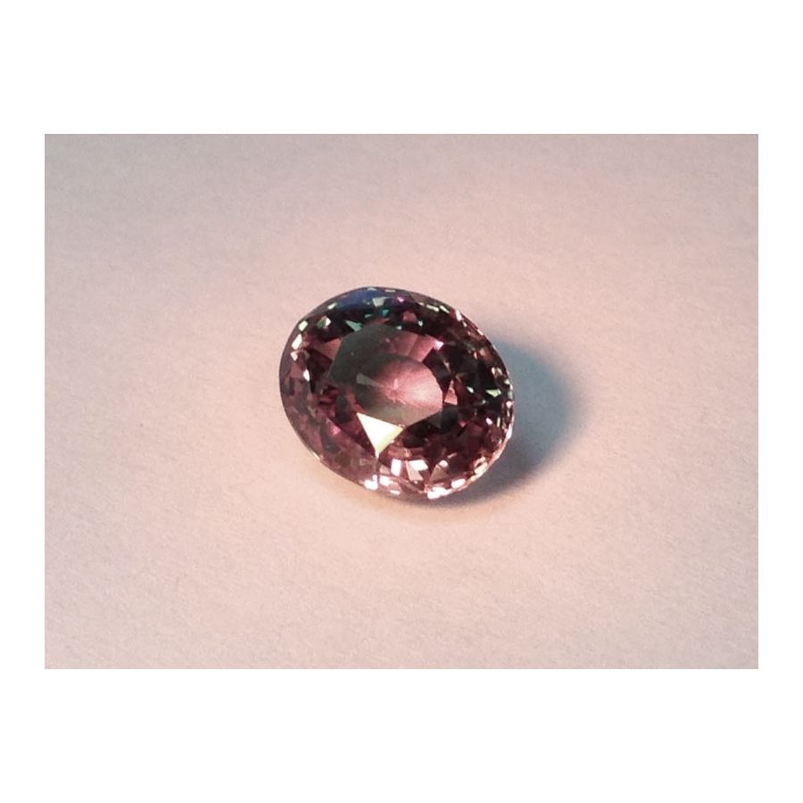 Natural Alexandrite yellowish green changing to pinkish brown color oval shape 2.56 carats with GIA Report