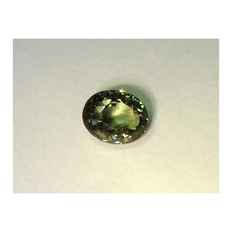 Natural Alexandrite yellowish green changing to pinkish brown color oval shape 2.56 carats with GIA Report
