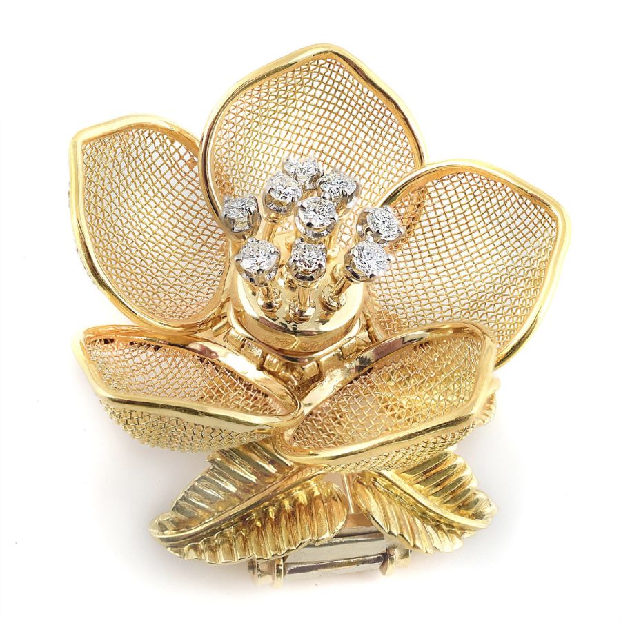Very Unique Flower Brooch with mechanically opening petals and dancing diamonds in 18K Yellow Gold