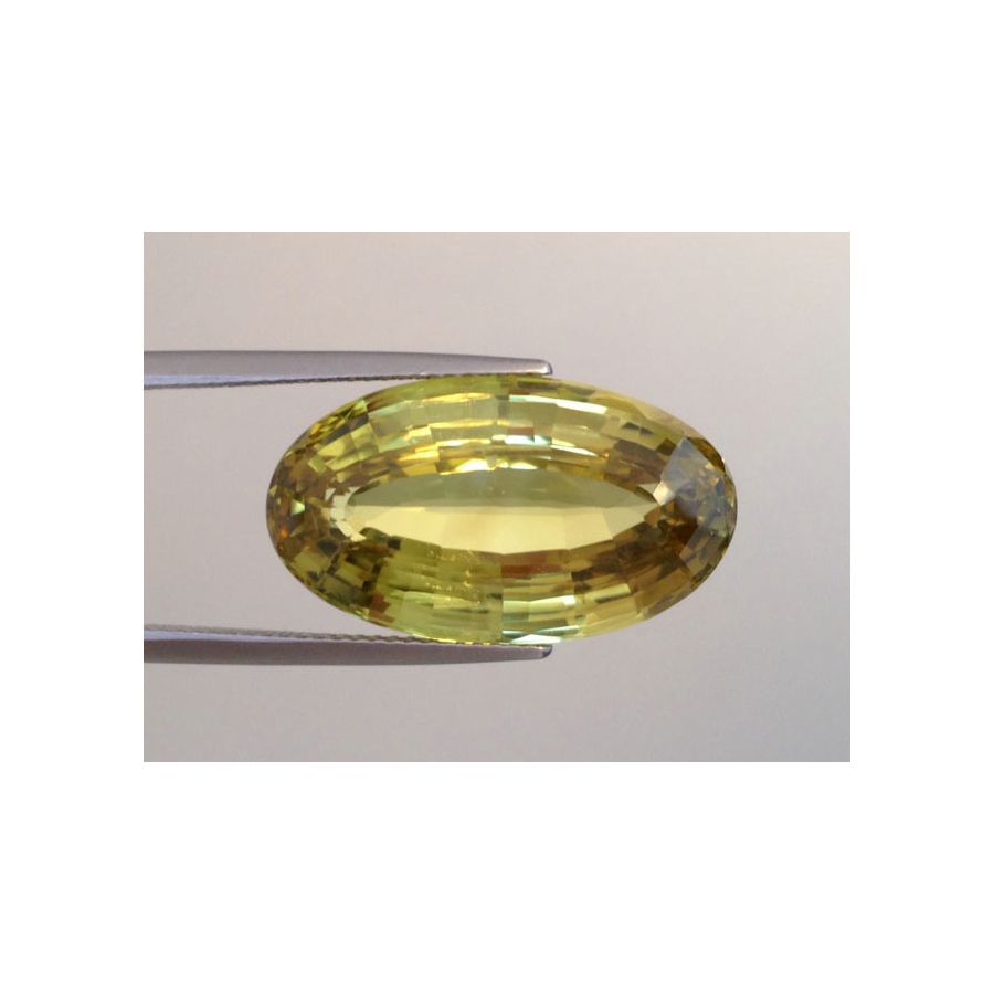 Natural Chrysoberyl greenish yellow color oval shape 28.09 carats with GIA Report
