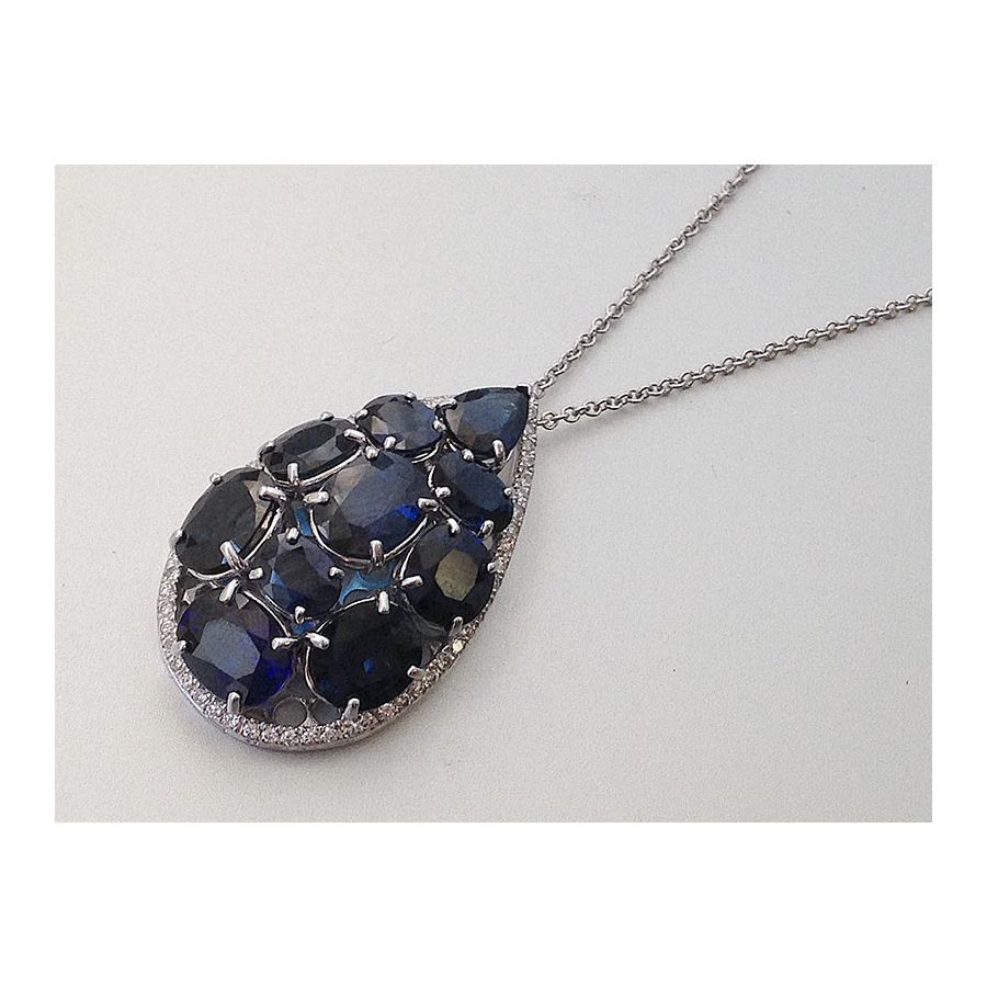 Natural Blue Sapphire 17.02 carats set in 14 & 18K White Gold Pendant with  0.50 carats Diamonds 
