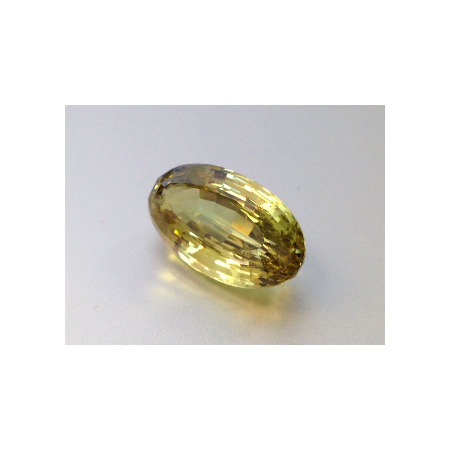 Natural Chrysoberyl greenish yellow color oval shape 28.09 carats with GIA Report