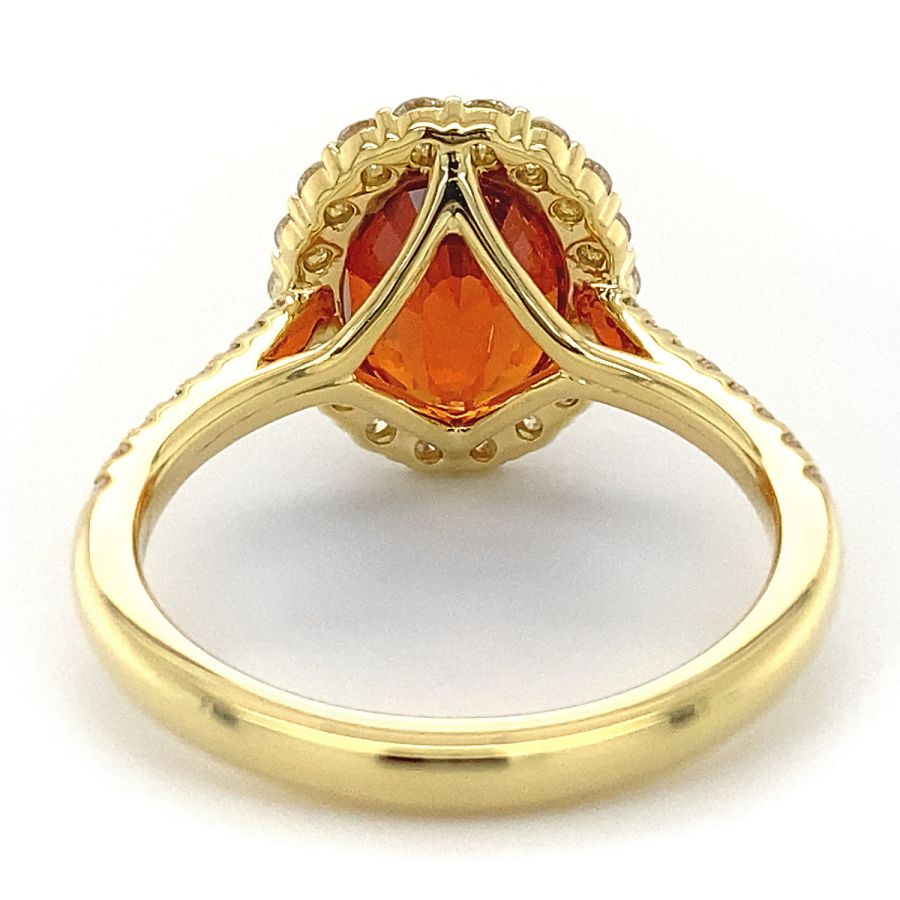 Natural Mandarin Garnet 5.07 carats set in 18K Yellow Gold Ring with 0.56 carats Diamonds 