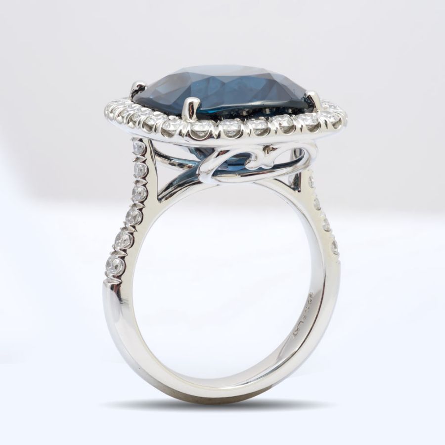 Natural Blue Spinel 14.27 carats set in Platinum Ring with 1.04 carats Diamonds