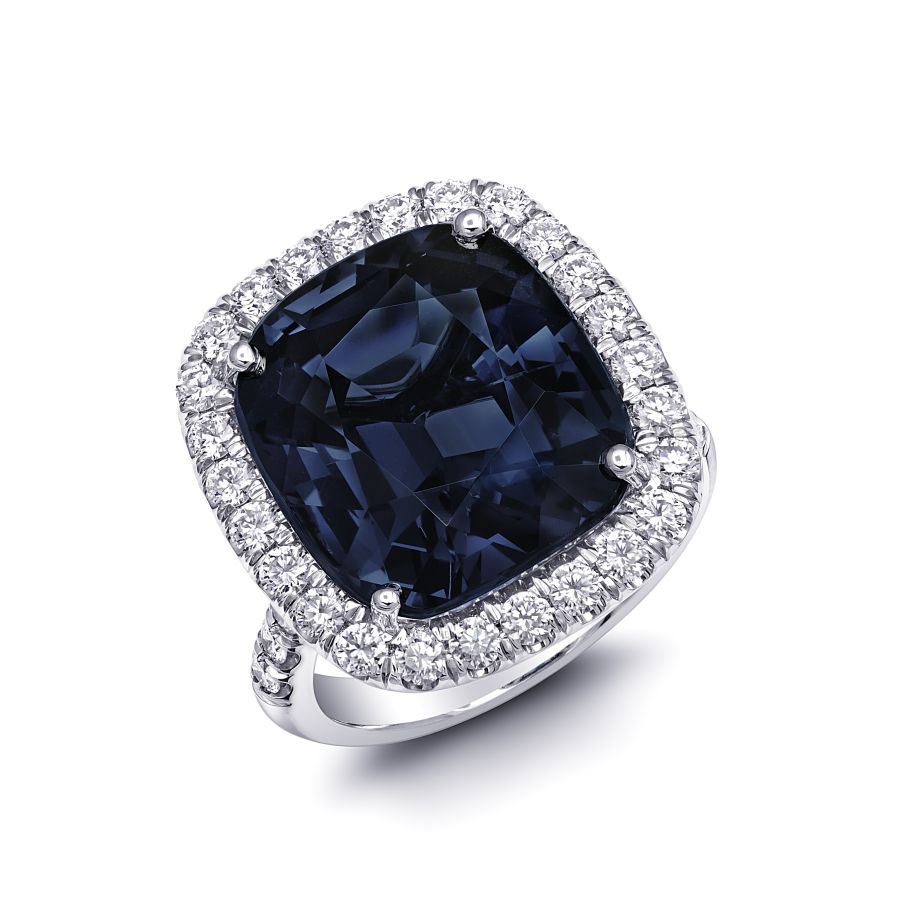 Natural Blue Spinel 14.27 carats set in Platinum Ring with 1.04 carats Diamonds