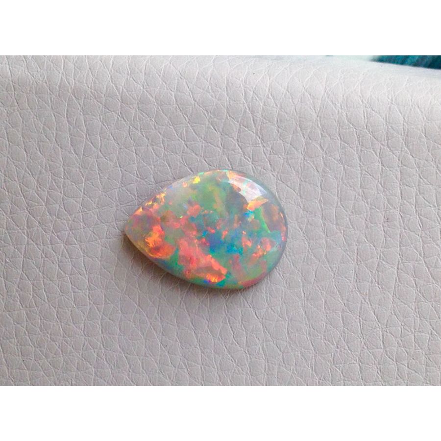 Black Boulder Opal multi color pear shape 5.50 carats - sold GSN on February