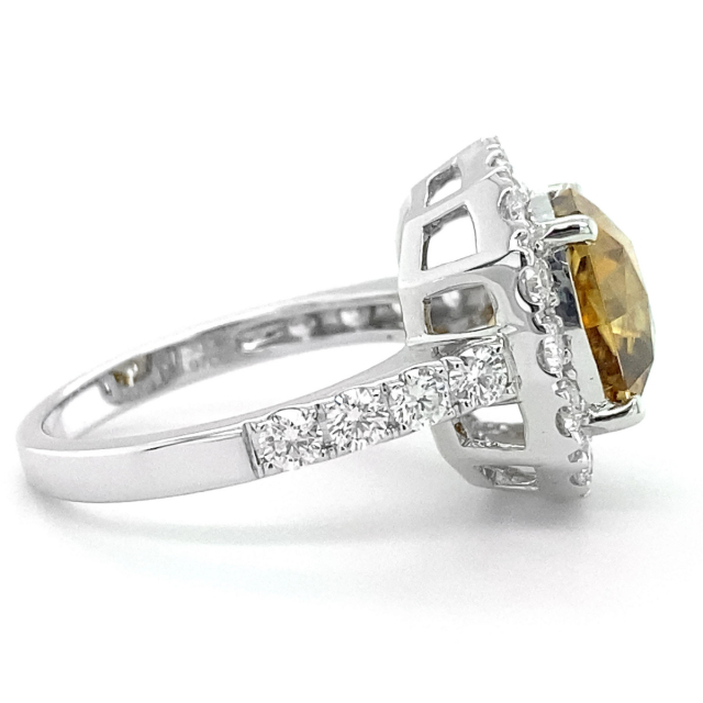 Natural Honey Orange Zircon 5.97 carats set in 18K White Gold Ring with 1.30 carats Diamonds 