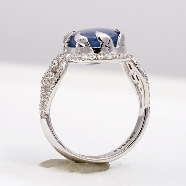 Natural Gray-Blue Star Sapphire 6.73 carats set in 14K White Gold Ring with 0.63 carats Diamonds