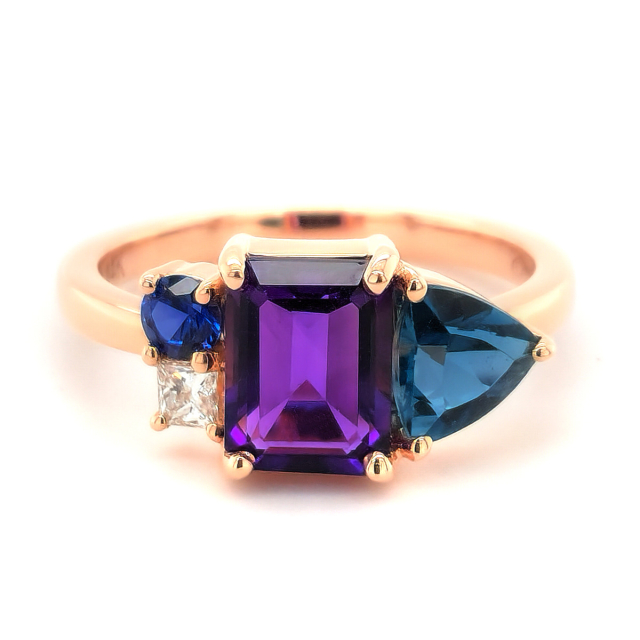 Natural Amethyst, Blue Topaz, Blue Sapphire, and Diamond 2.36 carats total weight set in 14K Rose Gold Ring