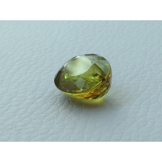 Natural Sphene oval shape 12.69 carats