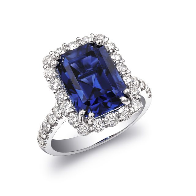 Natural Blue Sapphire 7.91 carats set in 18K White Gold Ring with Diamonds / AGTA Report